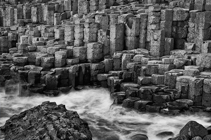 Waves crash against the basalt columns of the Giant's Causeway.