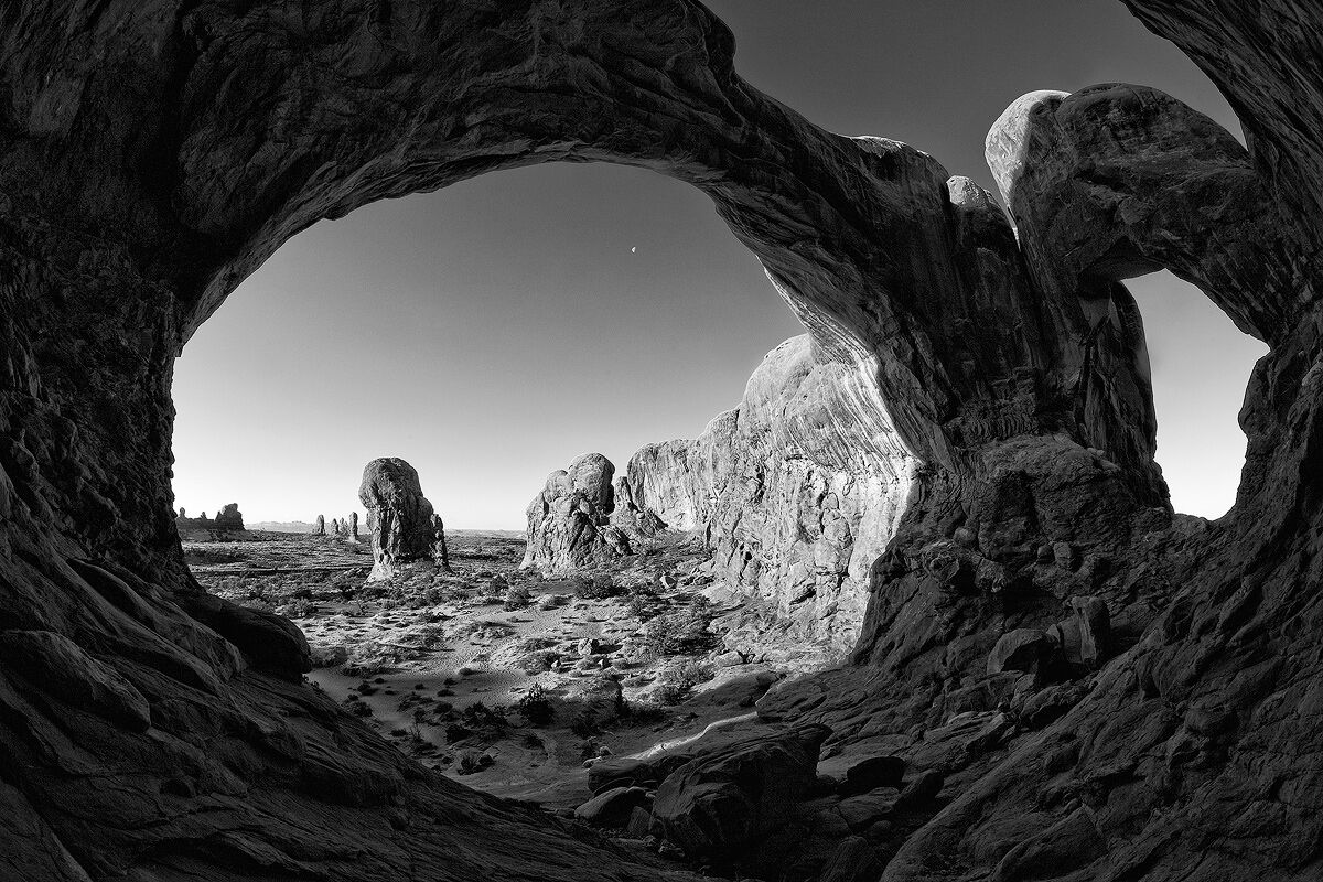 Double Arch A view from inside the Double Arch formation in the Windows section of Arches National Park.