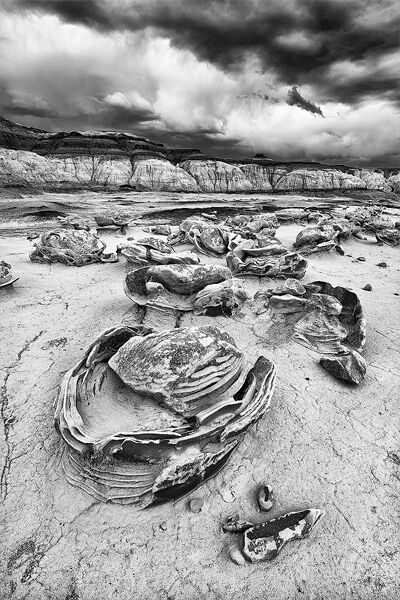 A storm approaches the Cracked Eggs formation in the Bisti Wilderness.
