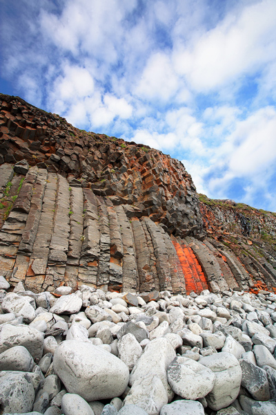 Basalt Beach These volcanic basalt columns are a bit unusual, as they rise out of the beach they bend 90 degrees. At the bend they are the...