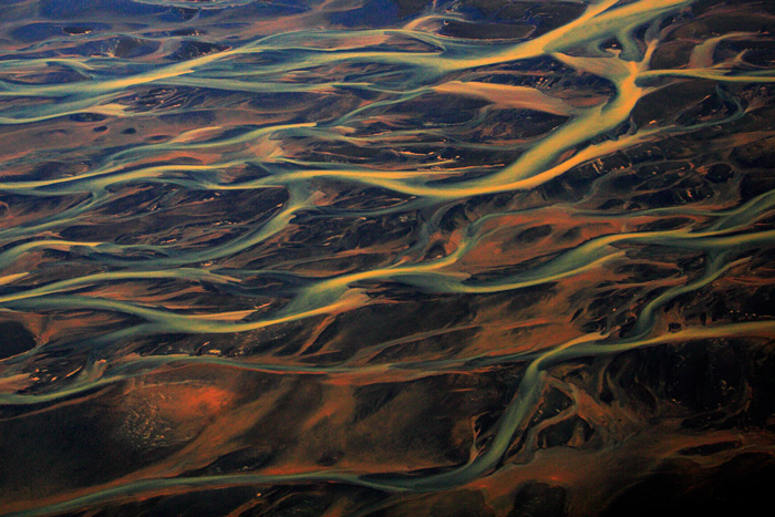 The Markaflojt River runs through a wide glacial plain that gathers hundreds of smaller glacial streams as it flows towards the...