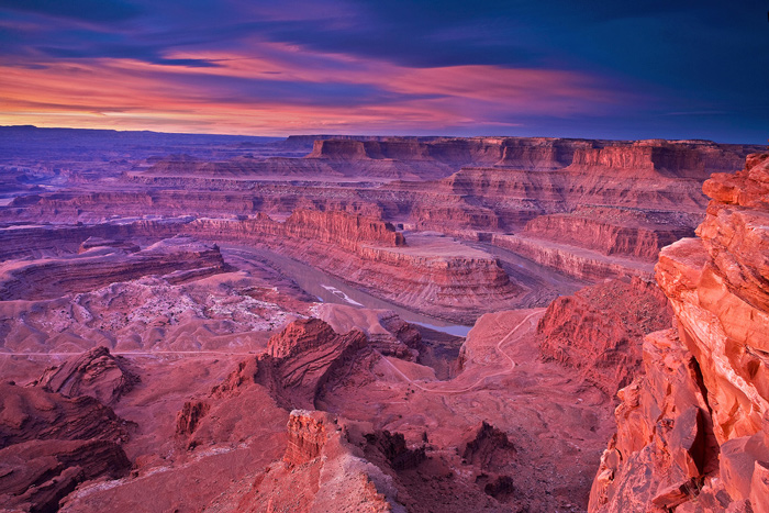 Beautiful sunrise view of the Colorado River and Canyonlands National Park beyond from Dead Horse Point near Moab.